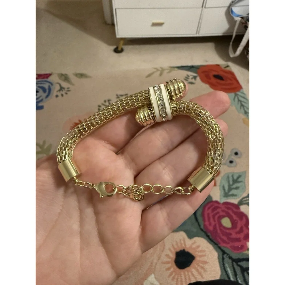 Gold Tone Mesh Knot Bracelet White Enamel Rhinestone Accents Adjustable Signed